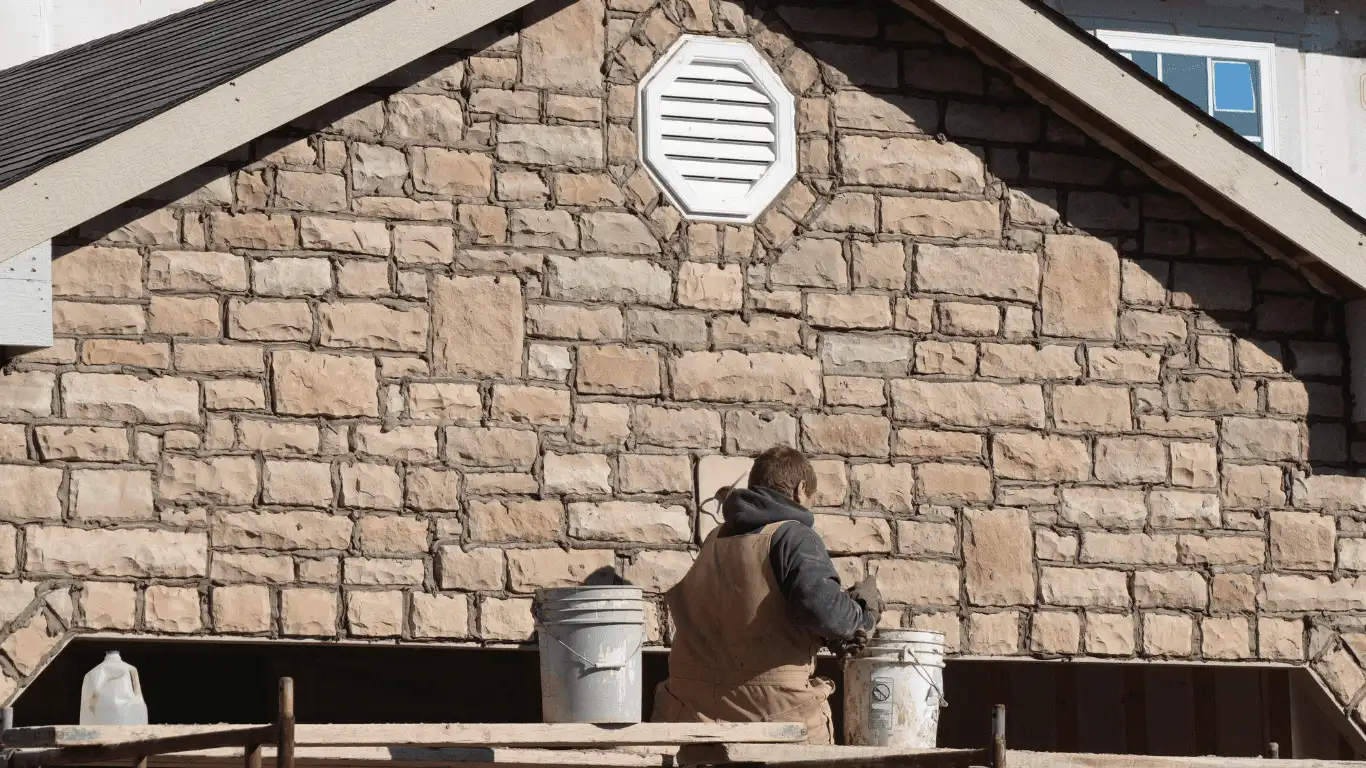 Lancaster home page header image of a staff working on a building in London Ontario
